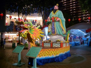 Qu Yuan on a Dragon Boat as depicted in a sculpture in Singapore on display during the Dragon Boat Festival. Photo by Vmenkov