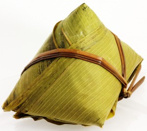 Zongzi: A traditional pyramid-shaped glutinous rice dumpling eaten during the Dragon Boat Festival